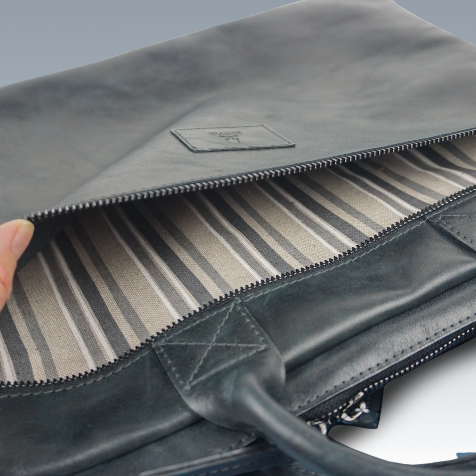Storm leren laptoptas